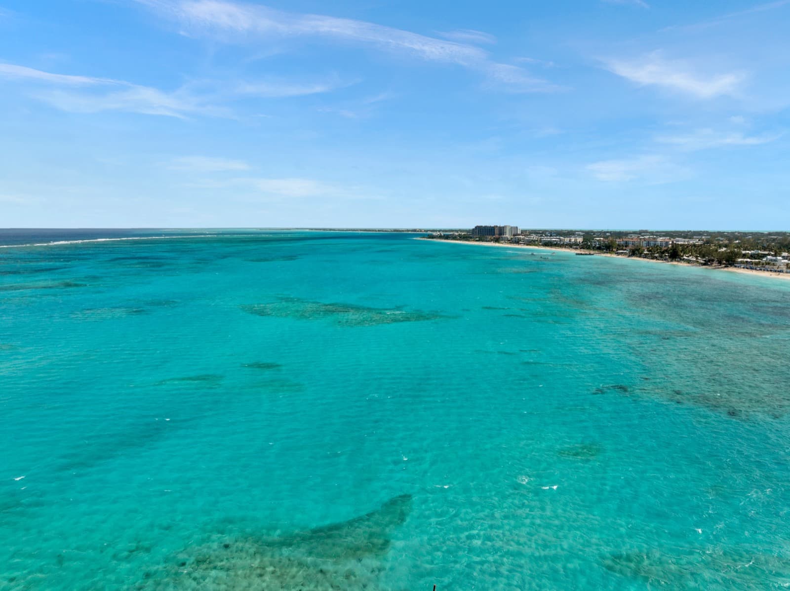 Calm turquoise water over the coral patches of The Bight